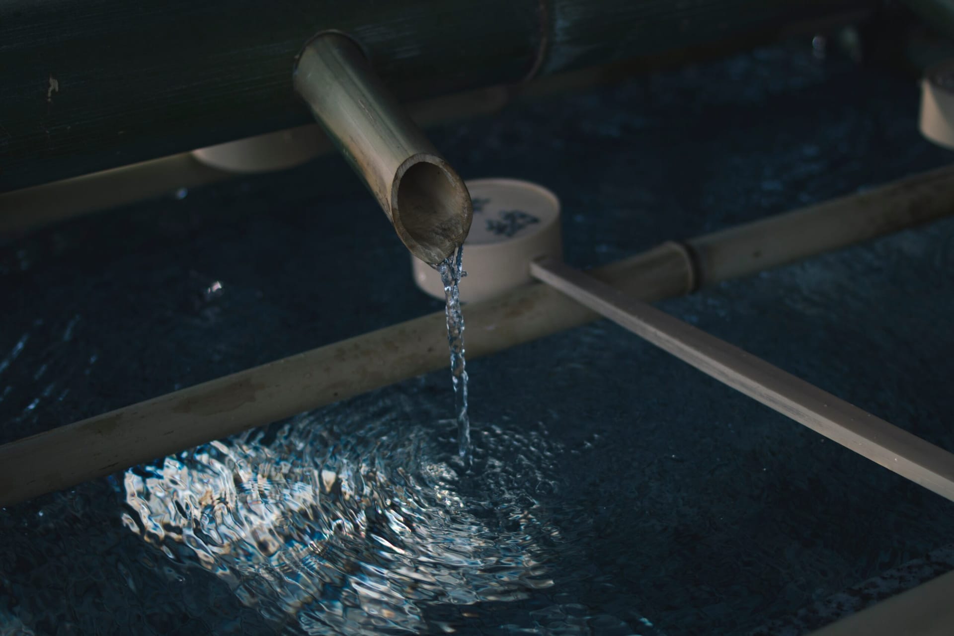 water flowing out of a pipe